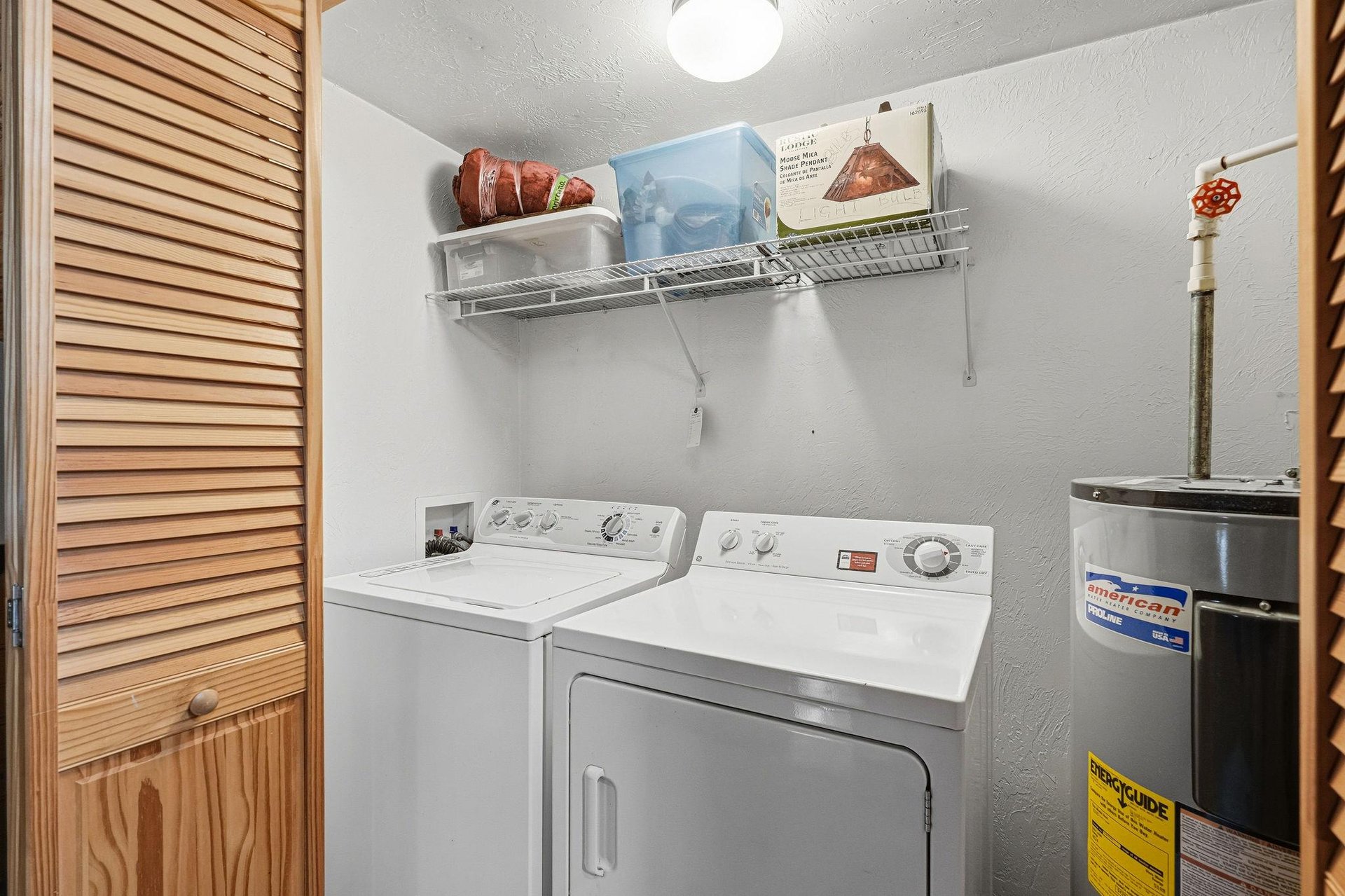Your private laundry room keeps your vacation wardrobe fresh with fullsize washer and dryer, plus convenient storage shelving.