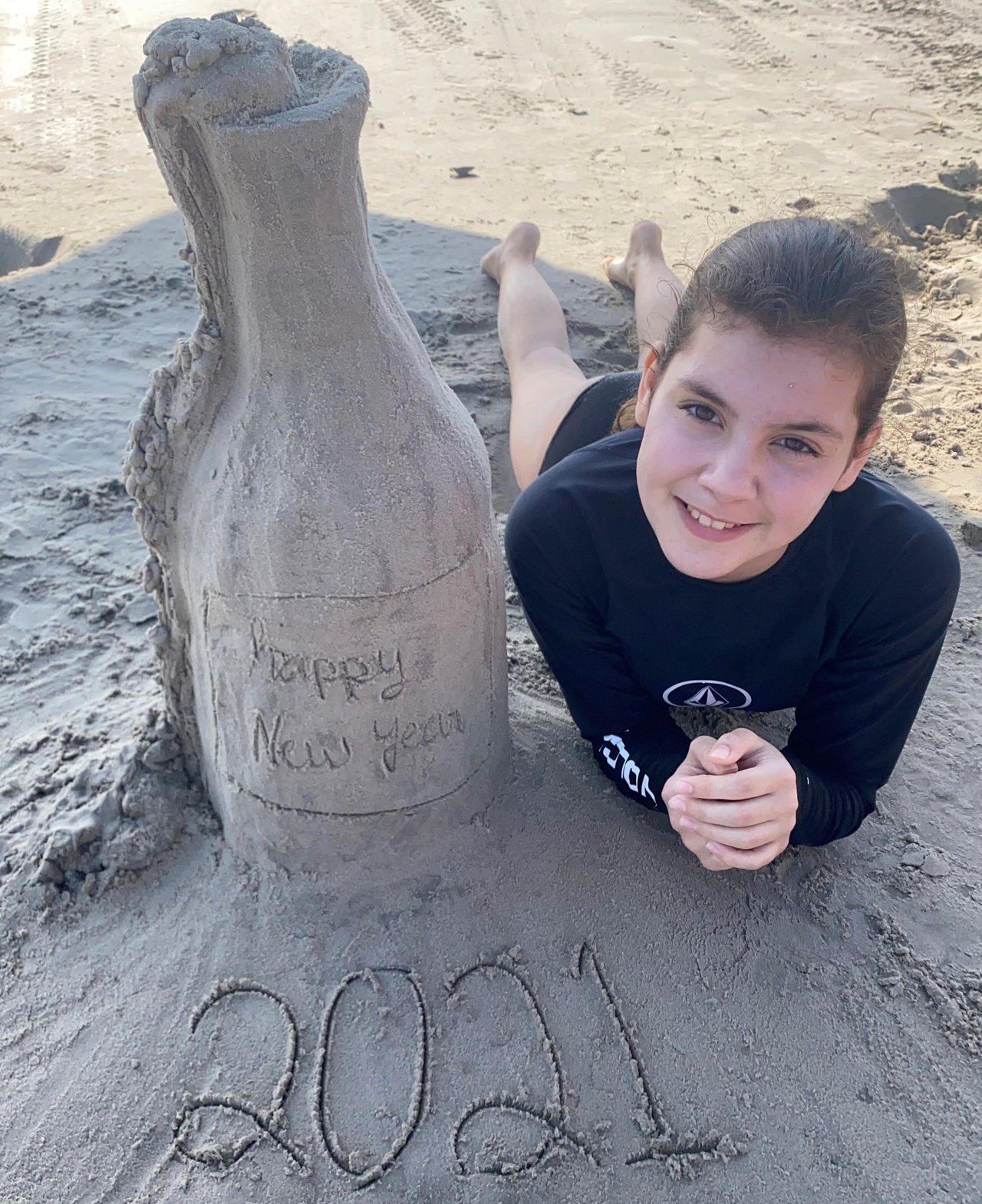 Yiannos child photo on beach.jpg_CROPPED IN