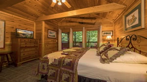 King bed with deck view