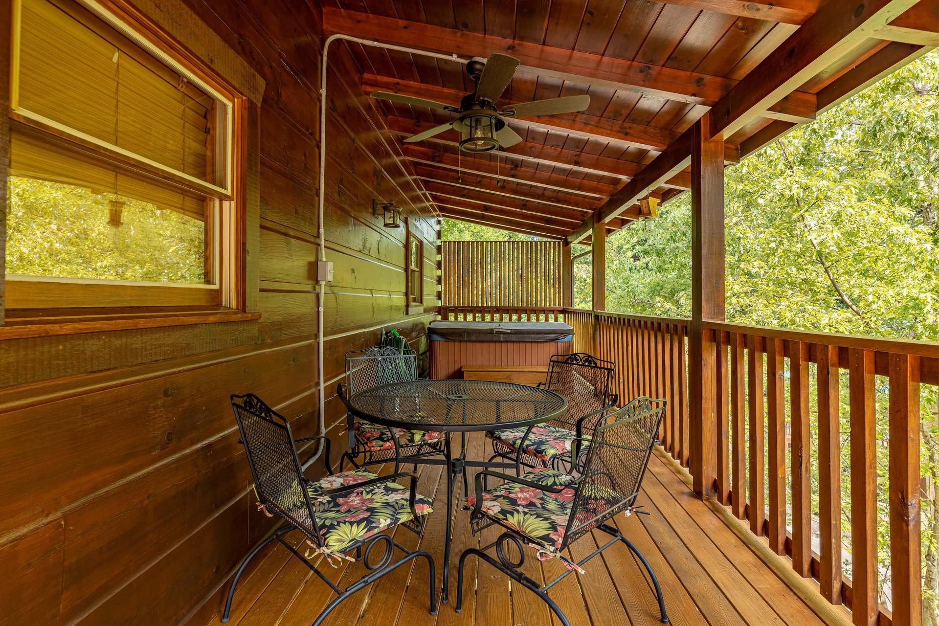 Outdoor dining for 4 at Livin Simple, a 2 bedroom cabin rental located in Pigeon Forge