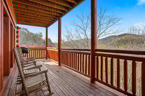 Rock gently in your chairs while soaking up stunning mountain views from your private covered deck—the perfect spot for morning coffee or evening relaxation.