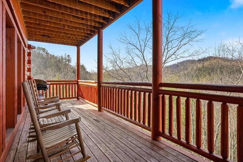 Rock gently in your chairs while soaking up stunning mountain views from your private covered deck—the perfect spot for morning coffee or evening relaxation.