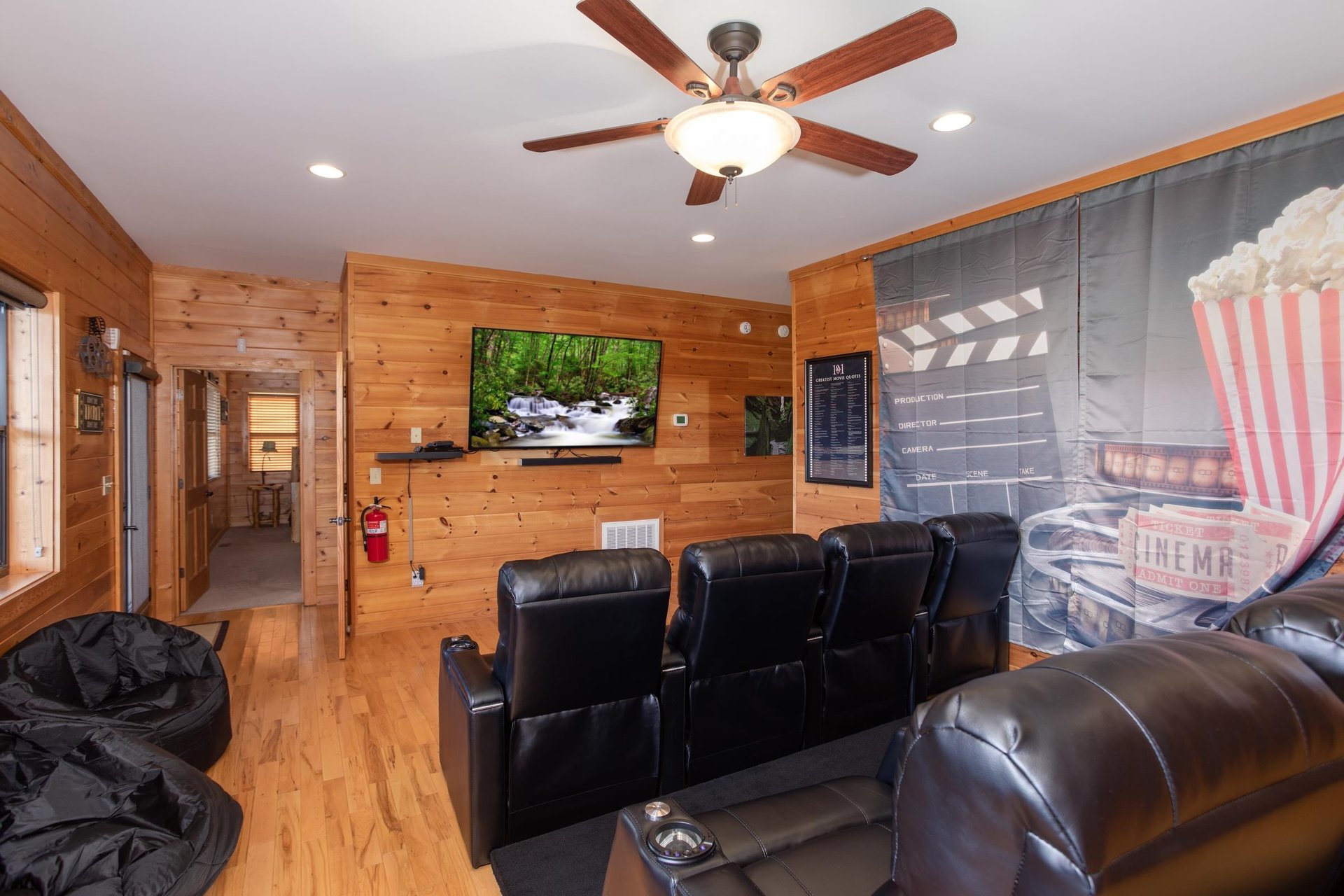 Theater room with bean bags and eight recliners at Great View Lodge, a 5bedroom cabin rental located in Pigeon Forge