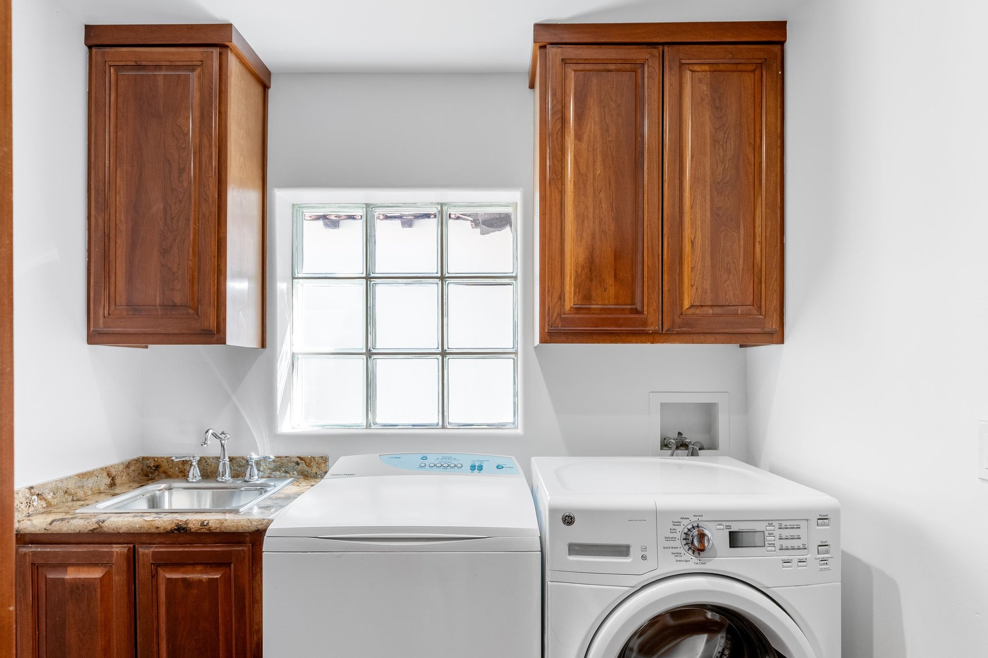 Laundry room adjacent to the kitchen