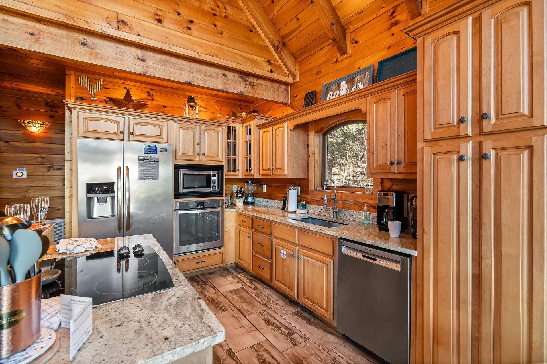 Kitchen with stainless appliances at Mountain Mama, a 3 bedroom cabin rental located in Pigeon Forge