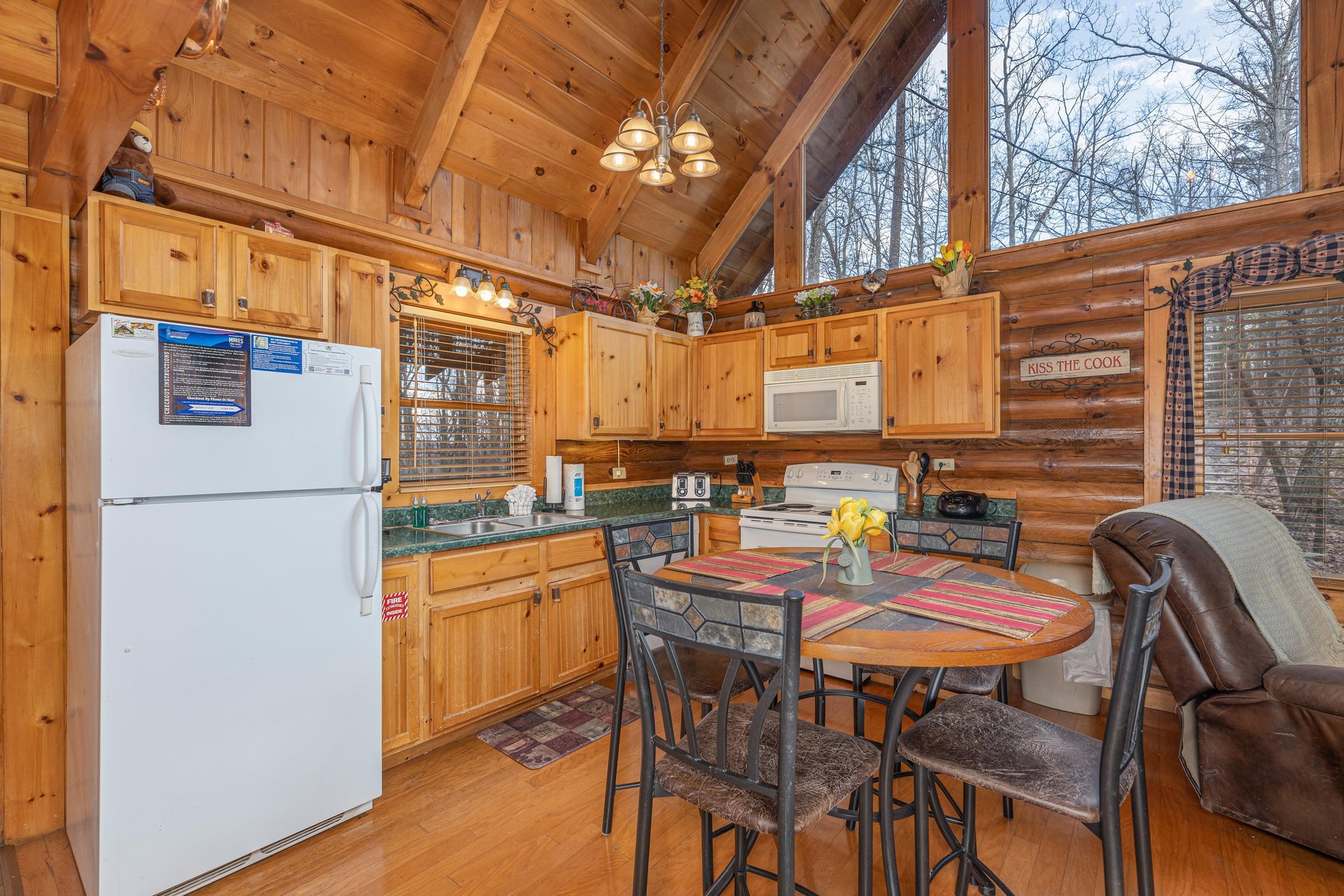 Kitchen and dining space at A Lovers Secret, a 1 bedroom cabin rental located in Gatlinburg