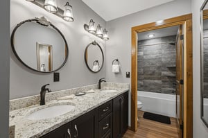 Step into your private spalike retreat with elegant granite counters, stylish fixtures, and a serene soaking tub just steps away.