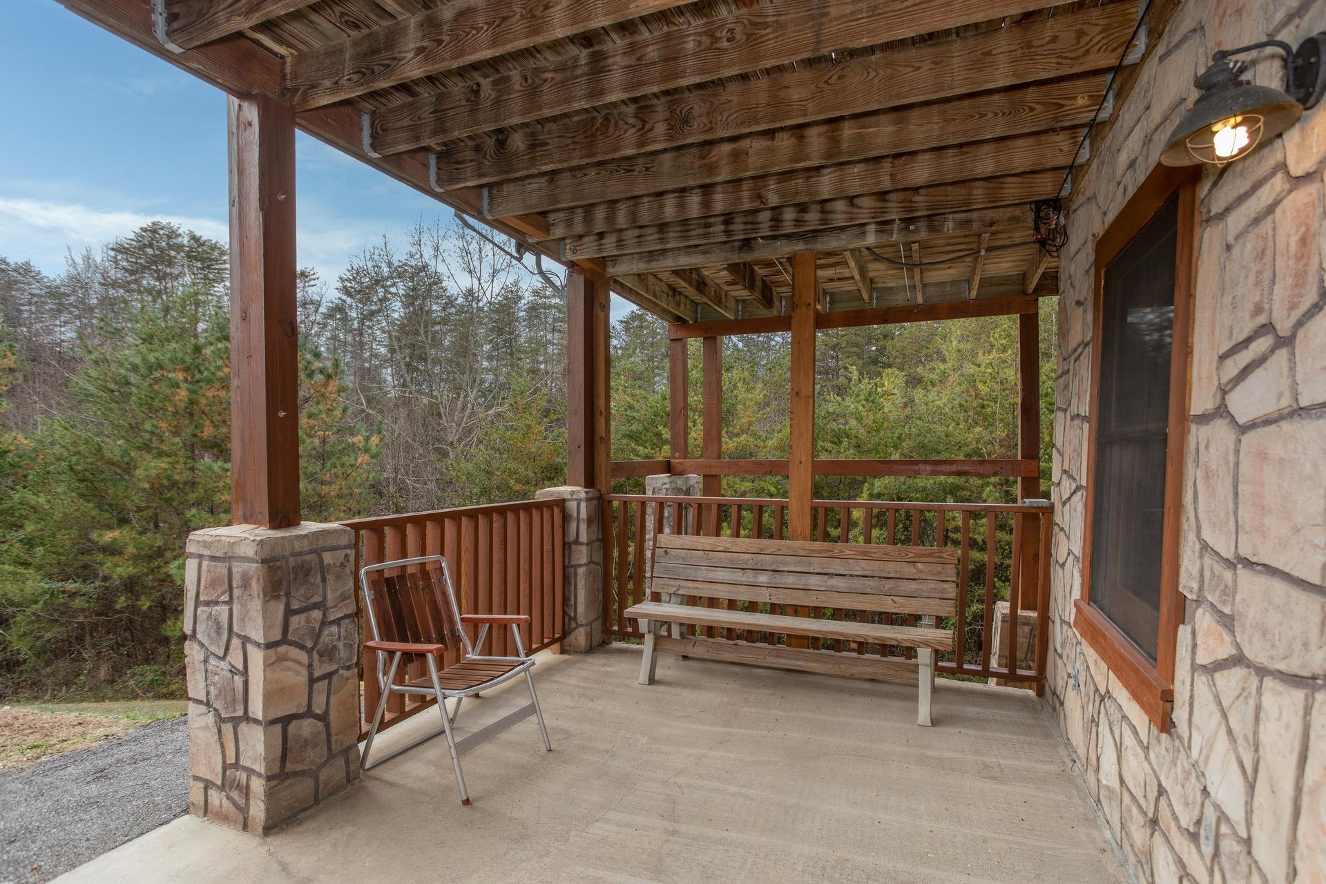 Porch access from the lower floor at Hibernation Station, a 3bedroom cabin rental located in Pigeon Forge