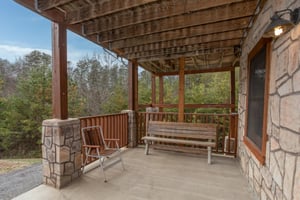Porch access from the lower floor at Hibernation Station, a 3bedroom cabin rental located in Pigeon Forge
