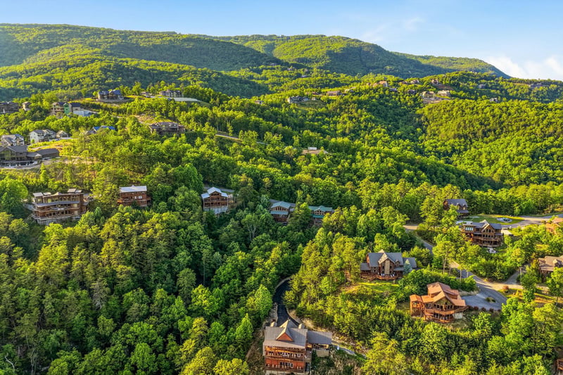 Nestled in lush green mountains, this scenic hillside community offers a tranquil retreat surrounded by natural beauty and forest views.