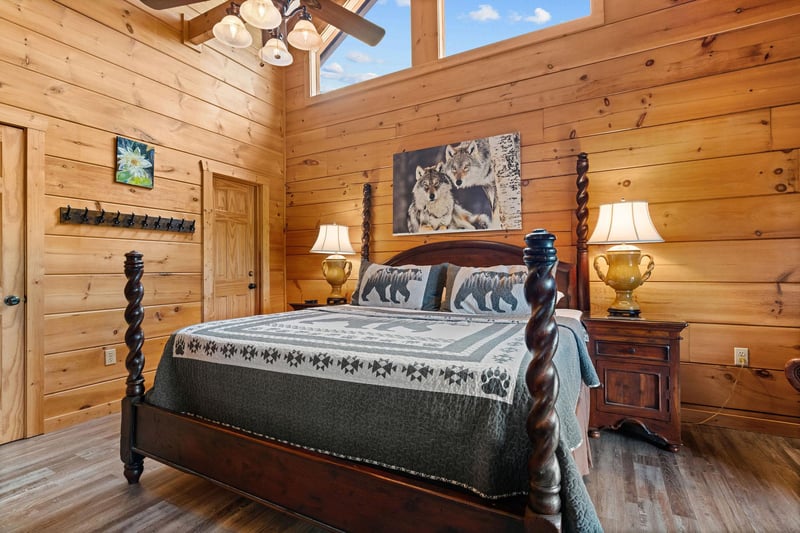 King bed with wolves wall picture