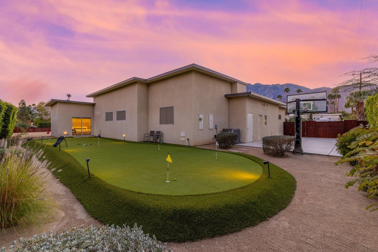 Incredible lighting and landscaping throughout
