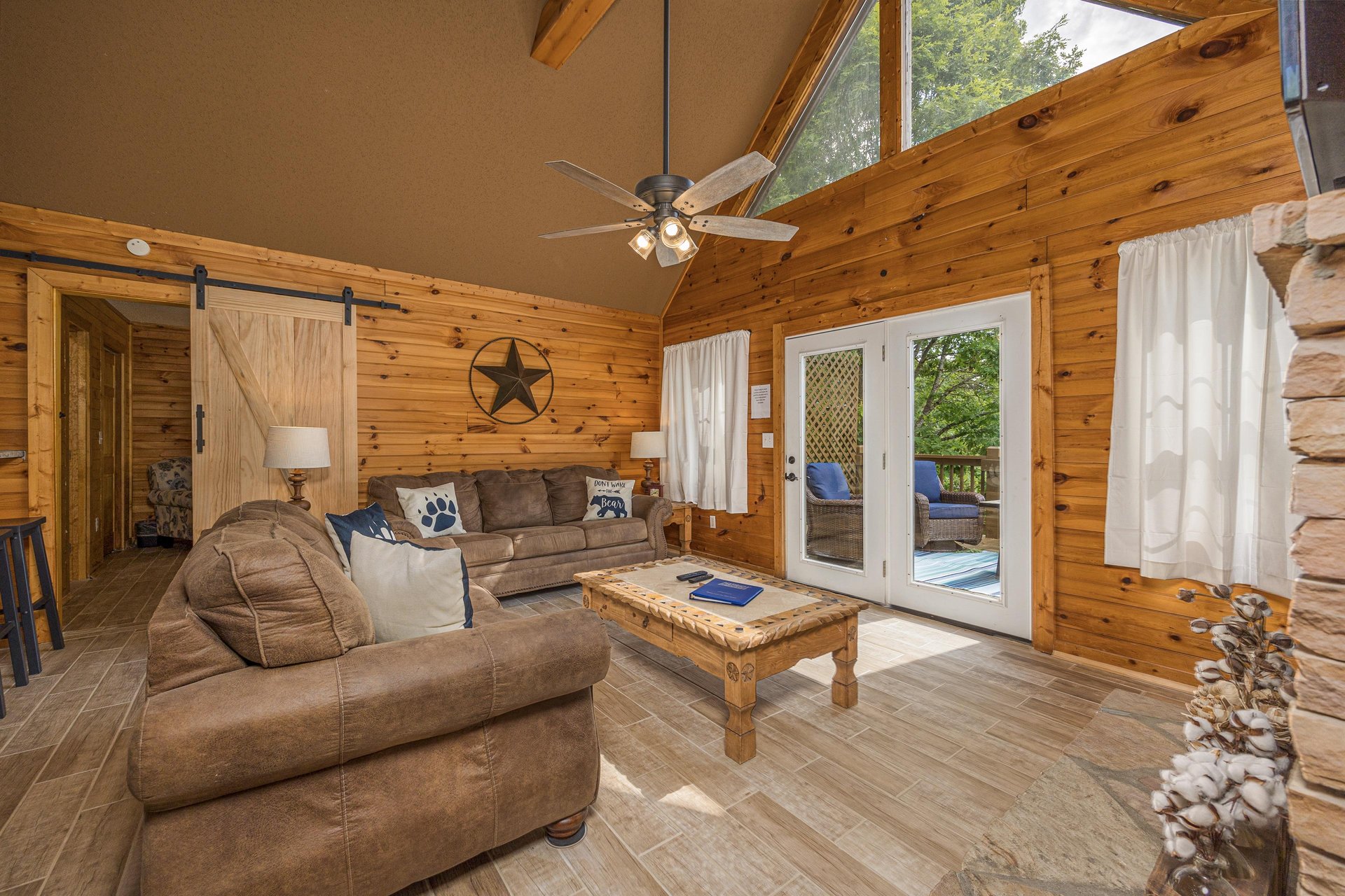 Living room with door to deck