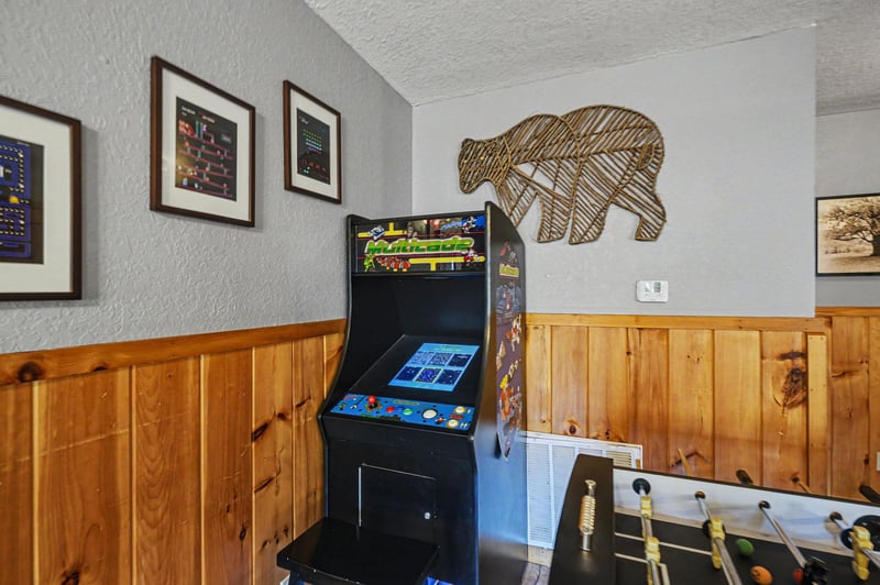 Challenge your friends to classic arcade games and foosball matches in this entertaining game room designed for endless fun.