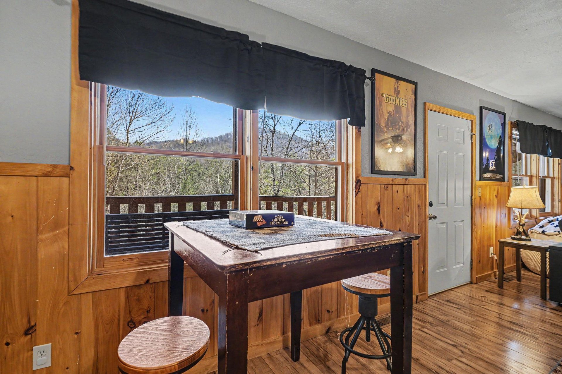 Challenge friends to a game at your rustic puzzle table while enjoying mountain views through the windows.