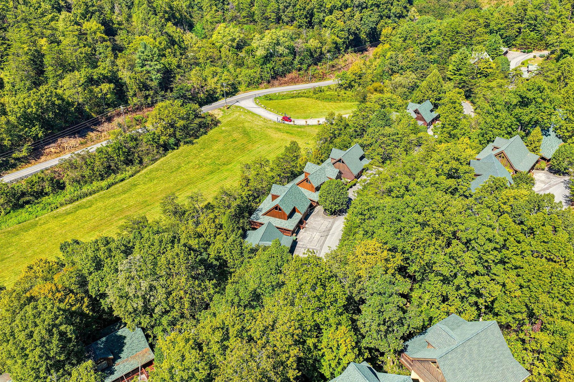 A private mountain retreat nestled among lush forest and meadows, offering complete seclusion and natural beauty in every direction.