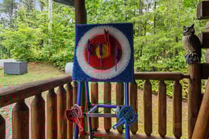 axe throwing game on front porch