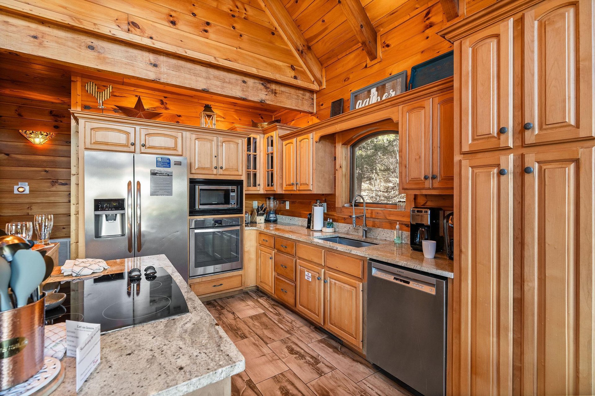 Kitchen with stainless appliances at Mountain Mama, a 3 bedroom cabin rental located in Pigeon Forge