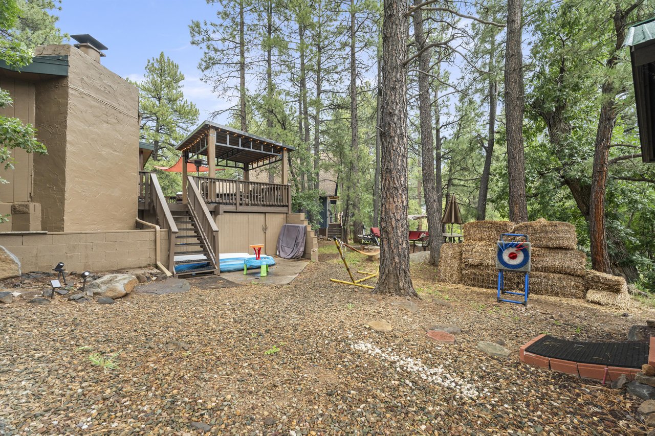 Outdoor space off of the deck with outdoor games.
