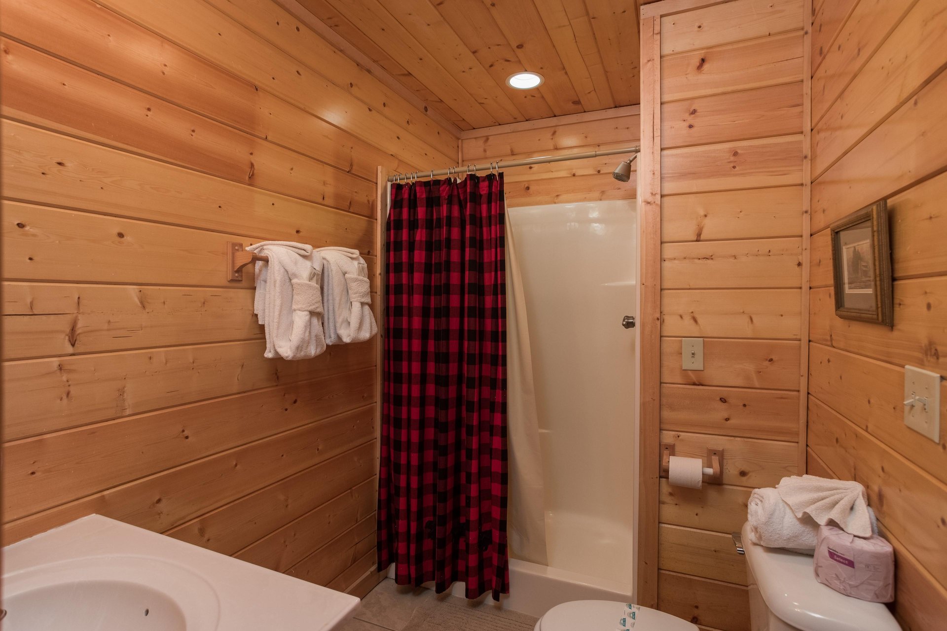 Bathroom with a shower at Kick Back  Relax A 4 bedroom cabin rental located in Pigeon Forge