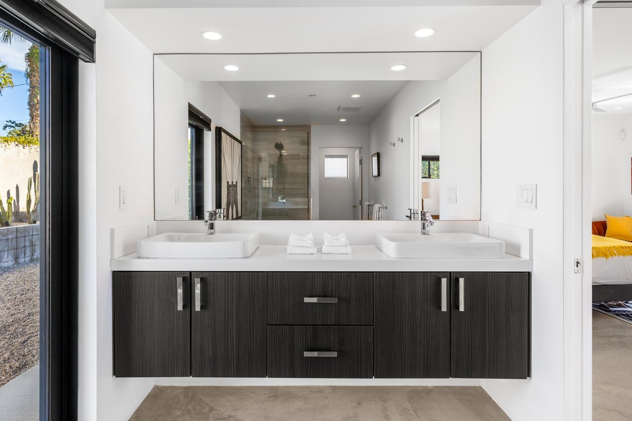 Primary bathroom with dual vanities