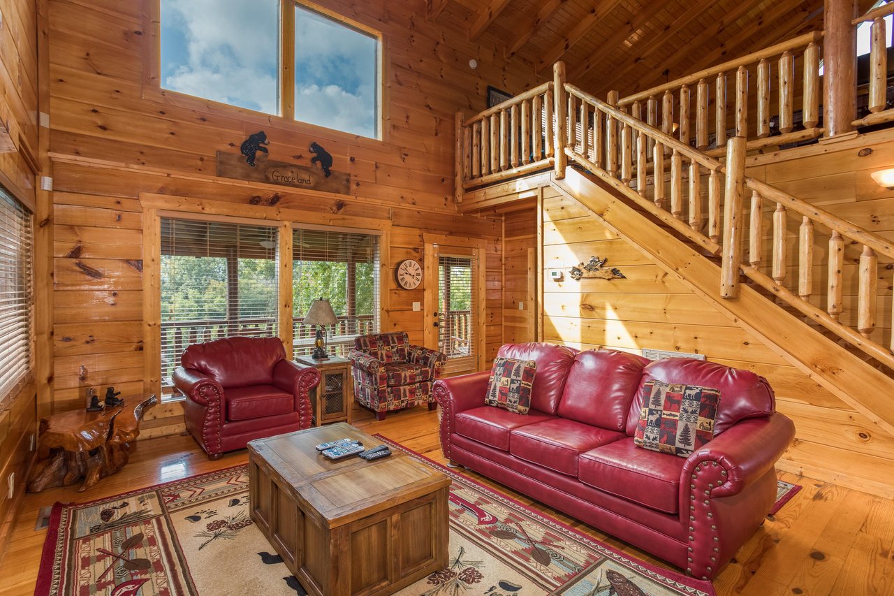 Sofa and two chairs in a living room at Graceland, a 4bedroom cabin rental located in Pigeon Forge