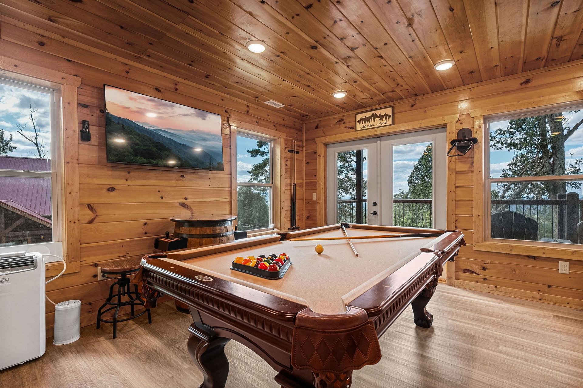 Pool table, TV and balcony access