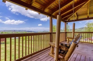 Perch on the porch swing and soak in the tranquil valley views framed by rolling mountains—perfect for morning coffee or watching the sun dip behind the hills.