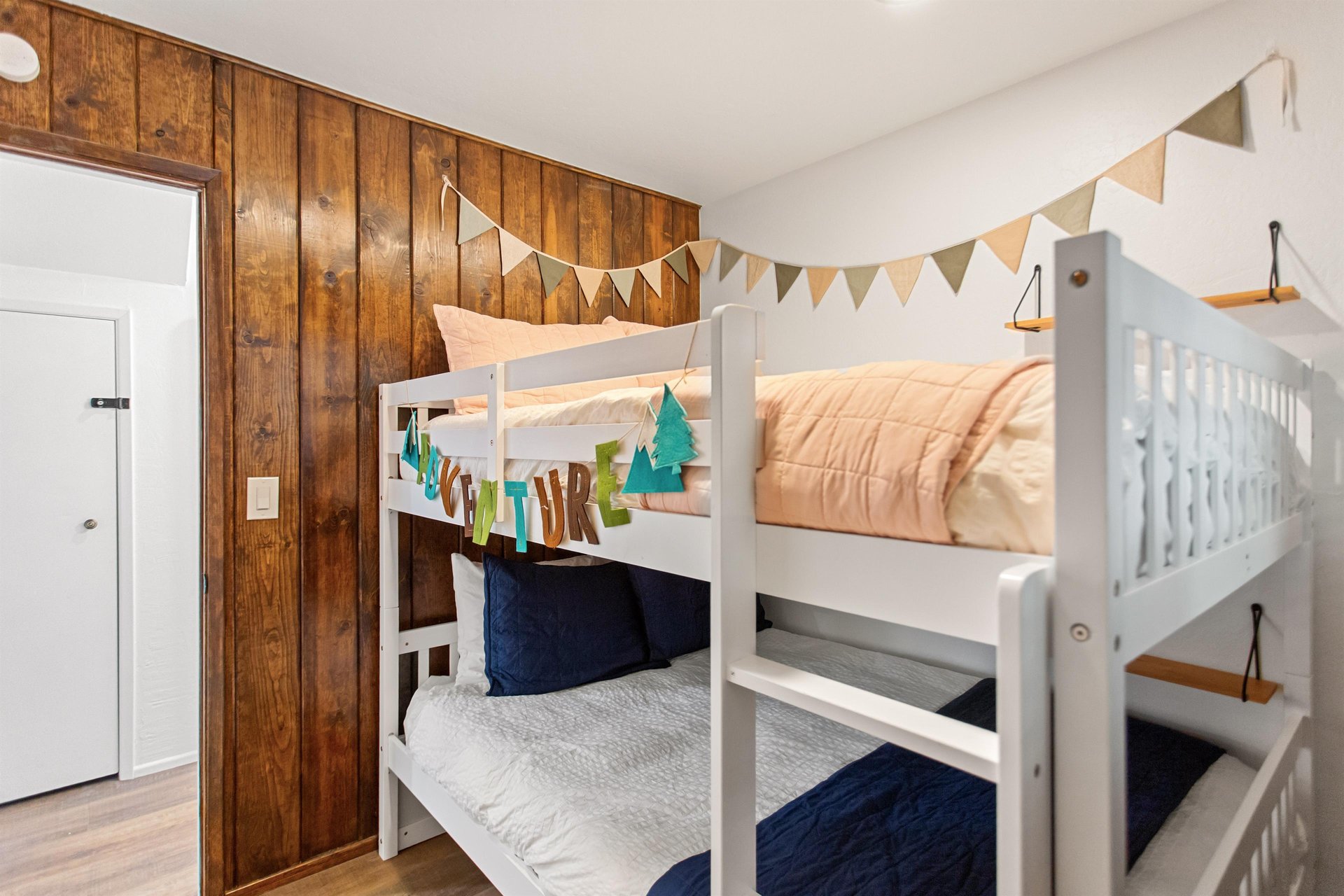 Full over full bunk beds located on the lower level.