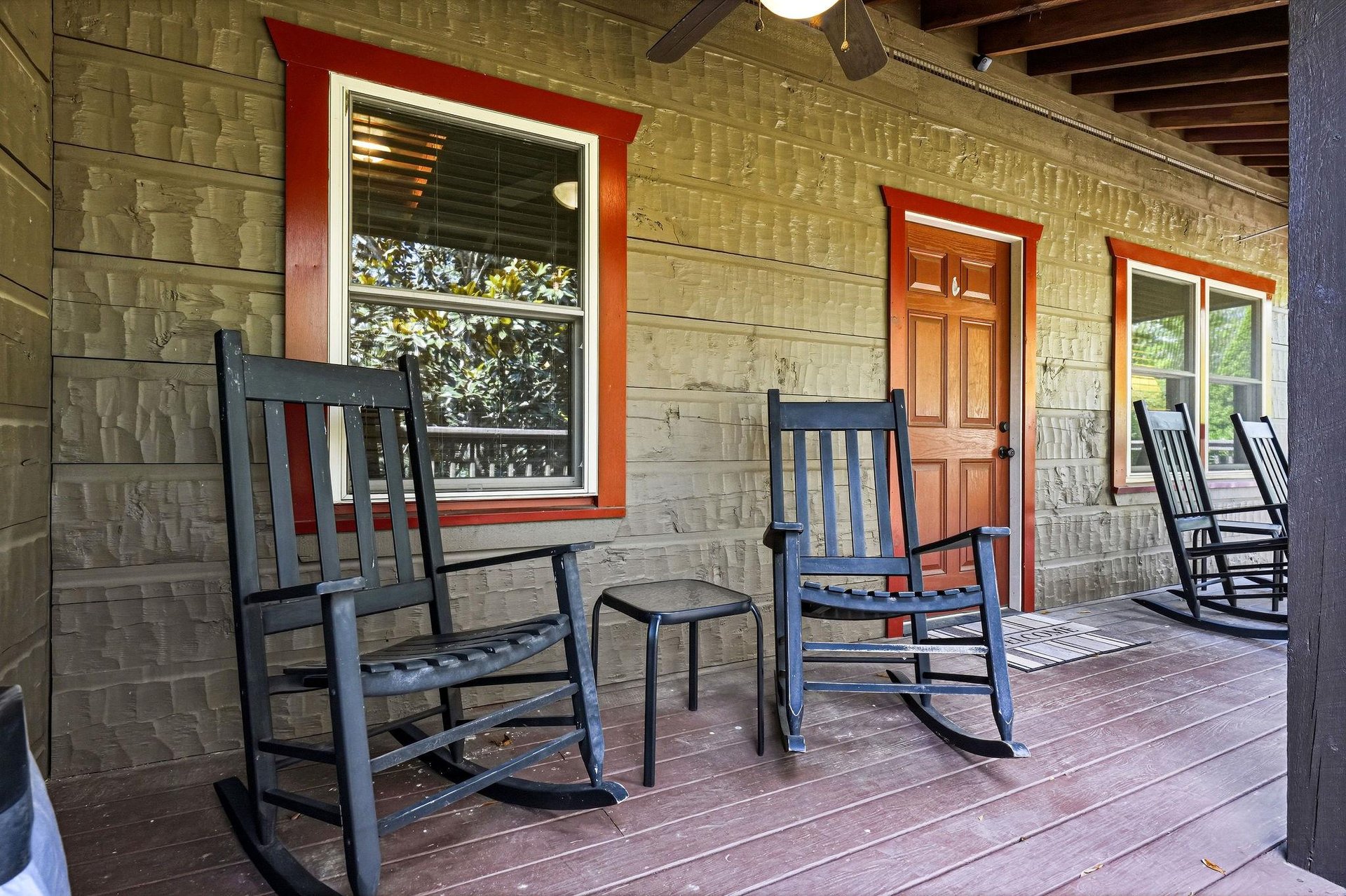 Picture yourself rocking gently in a chair on this peaceful porch, savoring morning coffee or watching the day wind down in total tranquility.