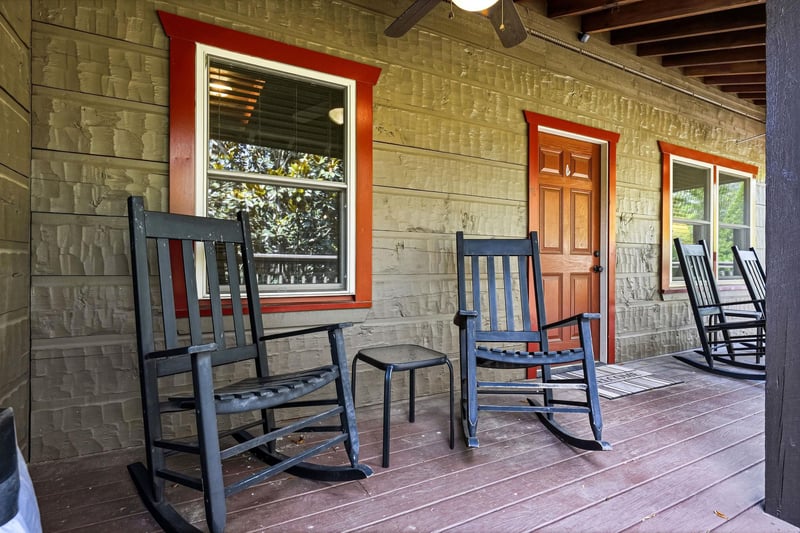Picture yourself rocking gently in a chair on this peaceful porch, savoring morning coffee or watching the day wind down in total tranquility.