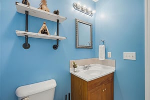 Freshen up in your bright bathroom with industrialstyle shelving and thoughtful touches that make your stay feel like home.