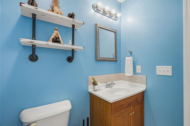 Freshen up in your bright bathroom with industrialstyle shelving and thoughtful touches that make your stay feel like home.