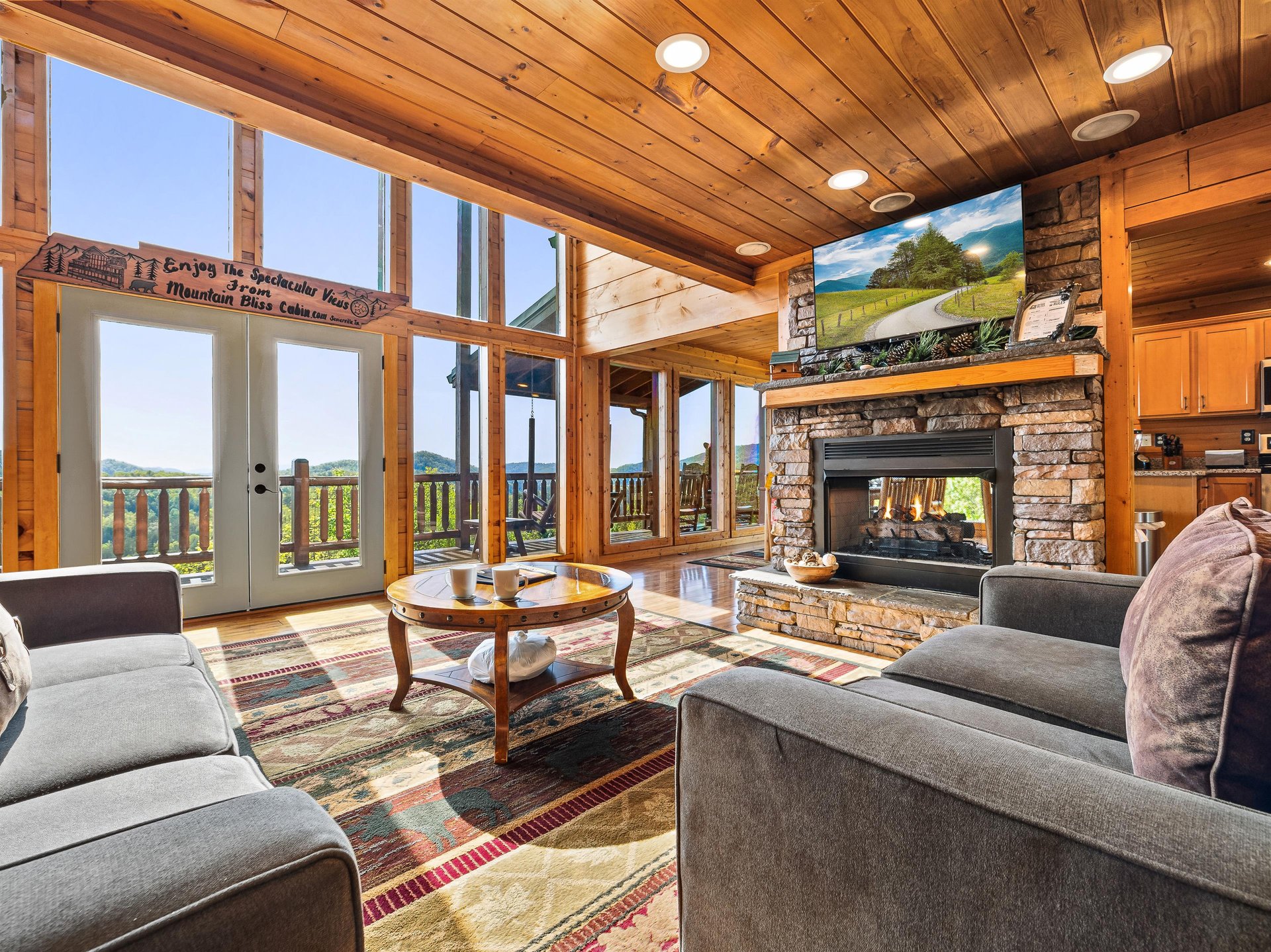 Living room with fireplace and tv