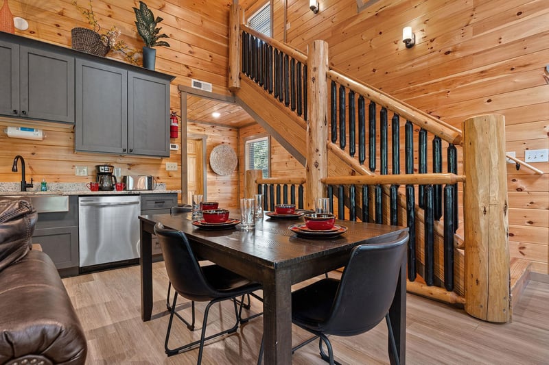 open concept layout with table for 4