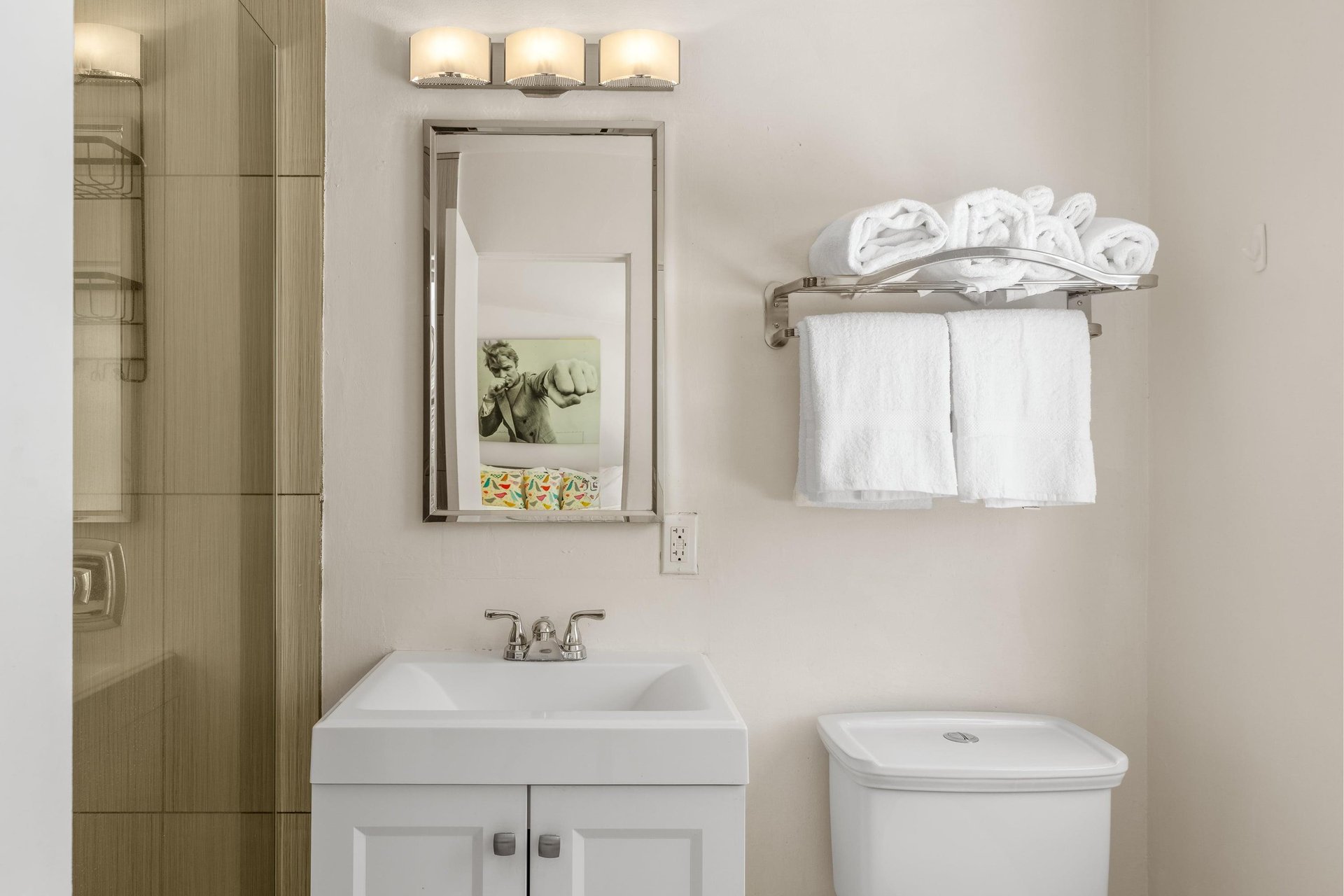 Ensuite bathroom in the primary bedroom with a walkin shower.