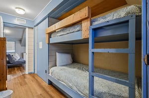 Your kids will love these cozy bunk beds with builtin privacy curtains and individual reading lights for bedtime stories.