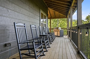 Settle into your rocking chair, fire up the grill, and breathe in the mountain air—this covered deck is your peaceful retreat after a day of adventure.
