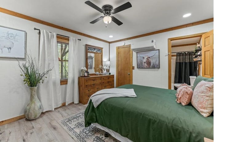 Drift into peaceful sleep in your cozy bedroom with rustic charm and modern comfort.