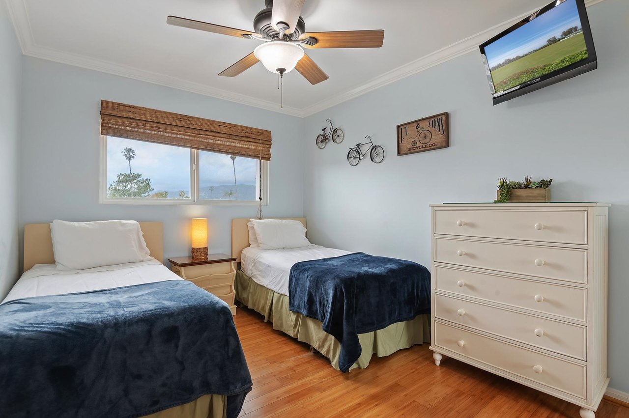 Two twin beds in the second bedroom