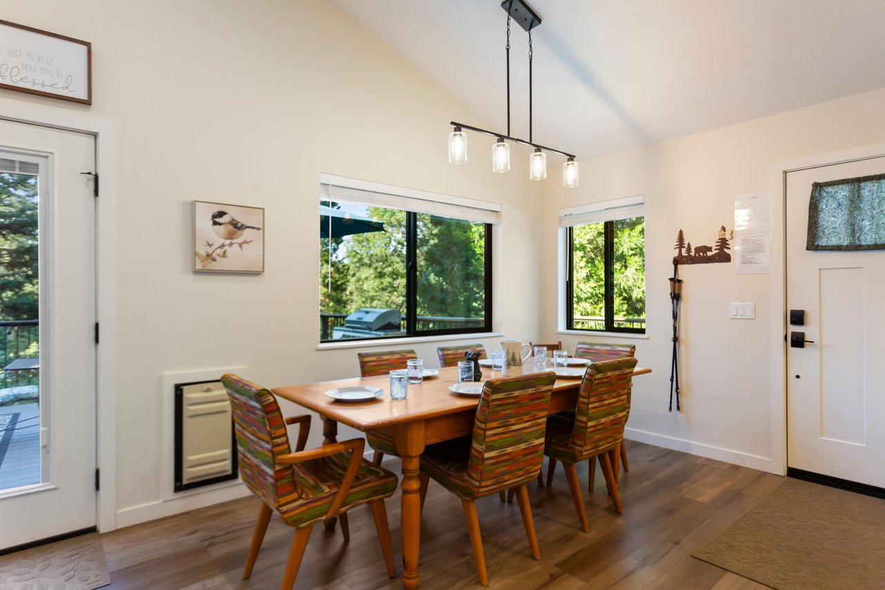 Dining for 6 surrounded by forest views