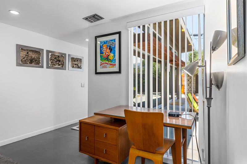 Functional hallway desk with backyard views