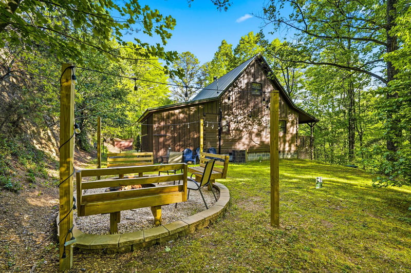 Charming forest cabin surrounded by towering trees and peaceful nature trails for the perfect woodland retreat experience.