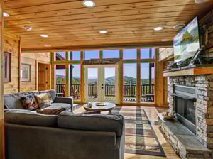 Living room with stone fireplace