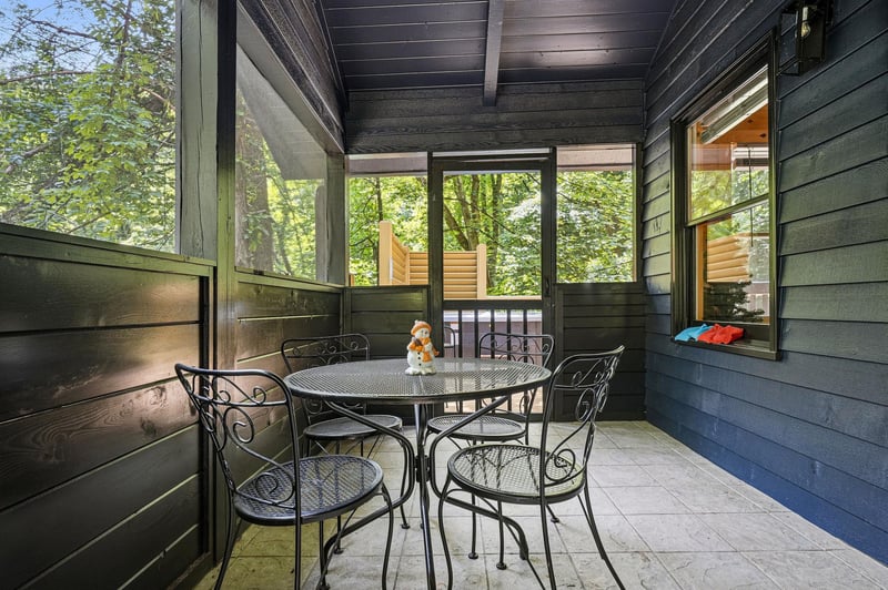 Picture yourself sipping morning coffee at your private patio table, surrounded by leafy trees and fresh air. This covered outdoor space invites you to dine alfresco, unwind with a book, or simply soa