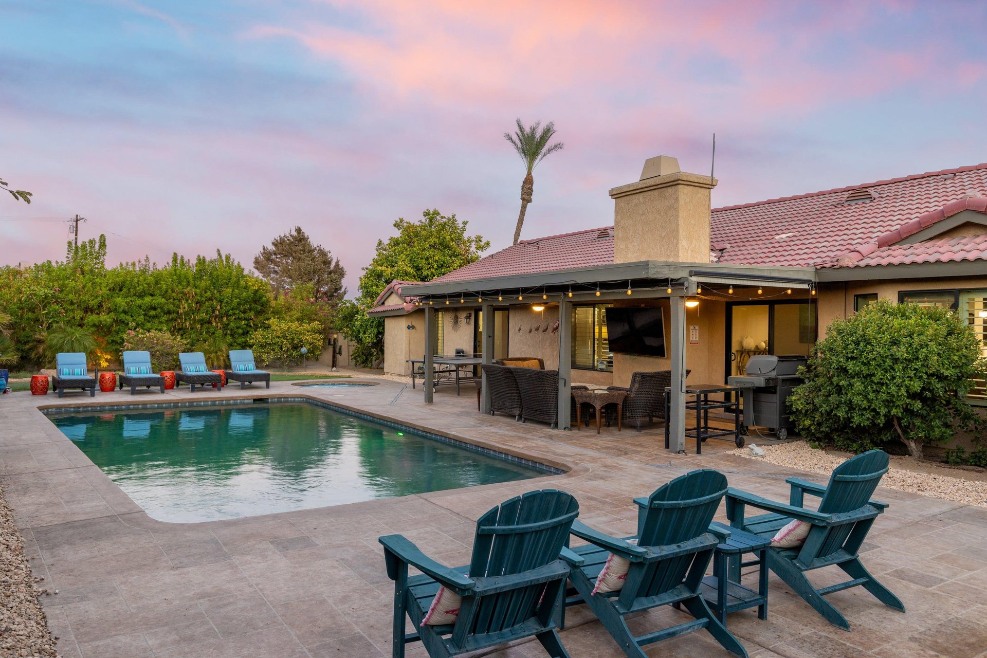 A modern 3 bedroom, 2.5 bathroom home with a private pool, spa, covered patio, and ping pong table located in Bermuda Dunes, CA.