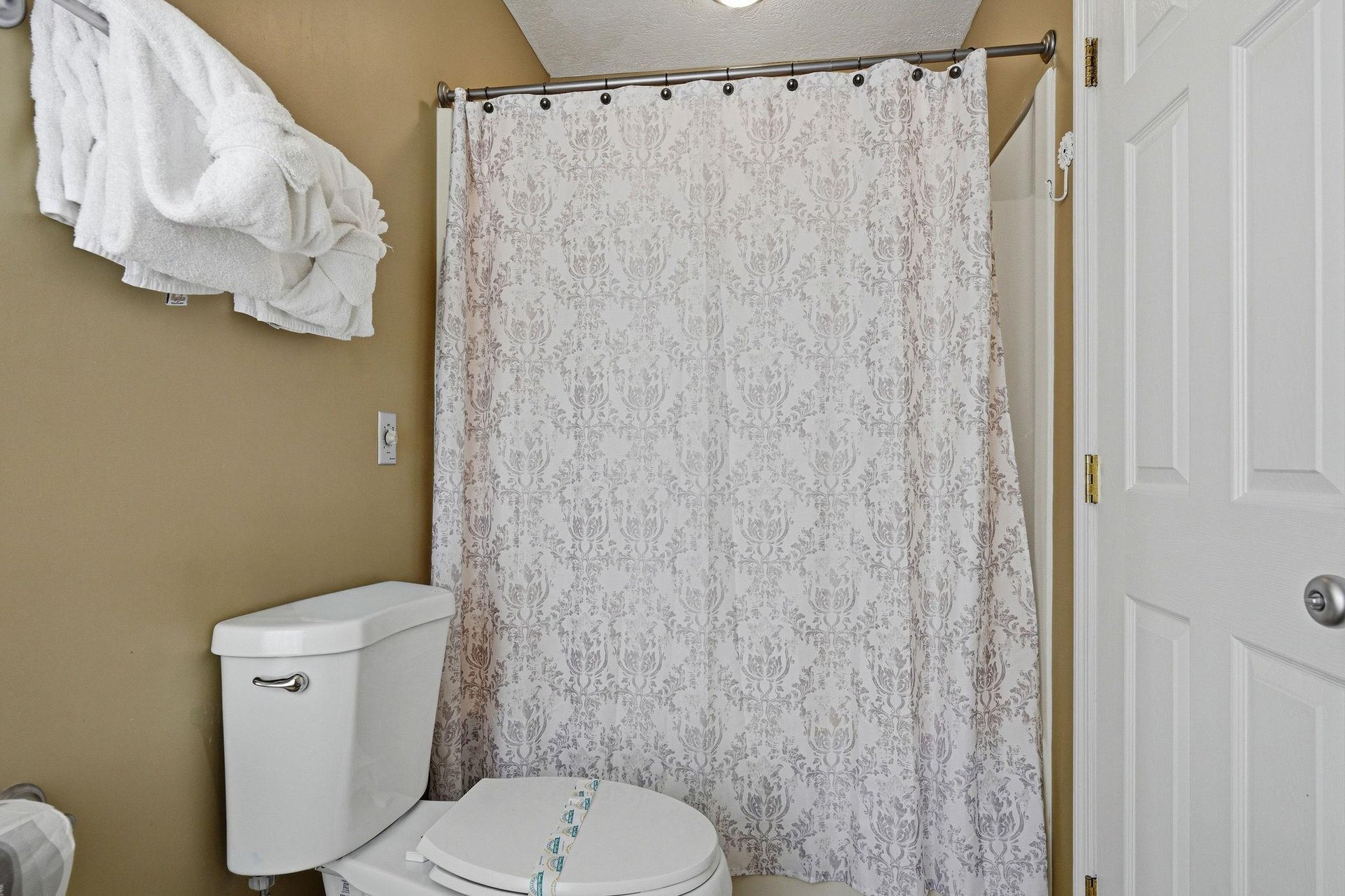 Step into your private bathroom, complete with a fresh shower, fluffy towels, and all the comforts you need to feel pampered and refreshed throughout your stay.