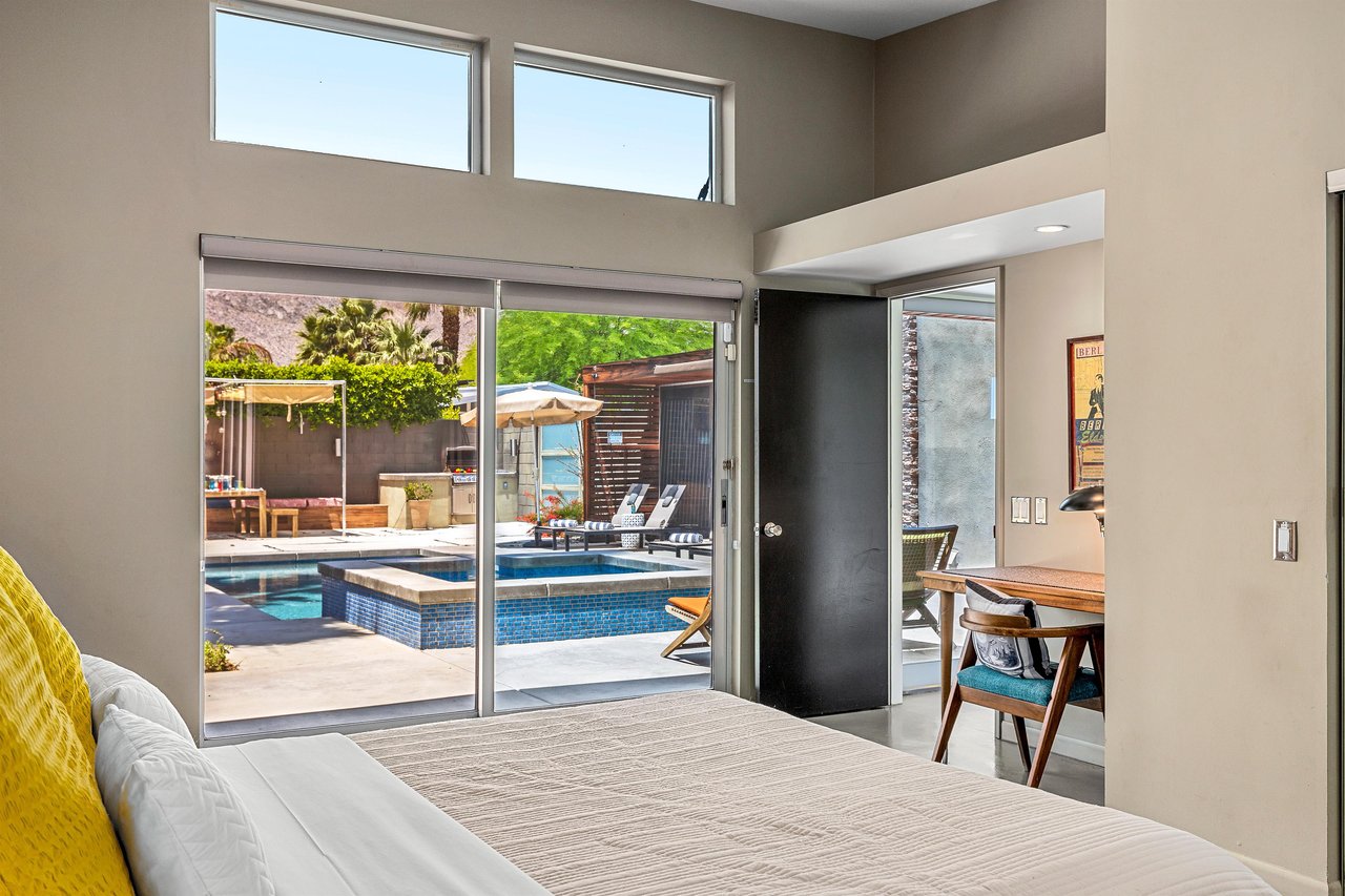 Bedroom with easy outdoor access via sliding doors