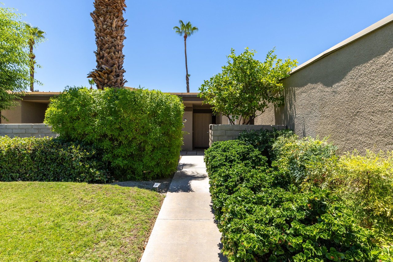 Walkway leading to the front door of the home.