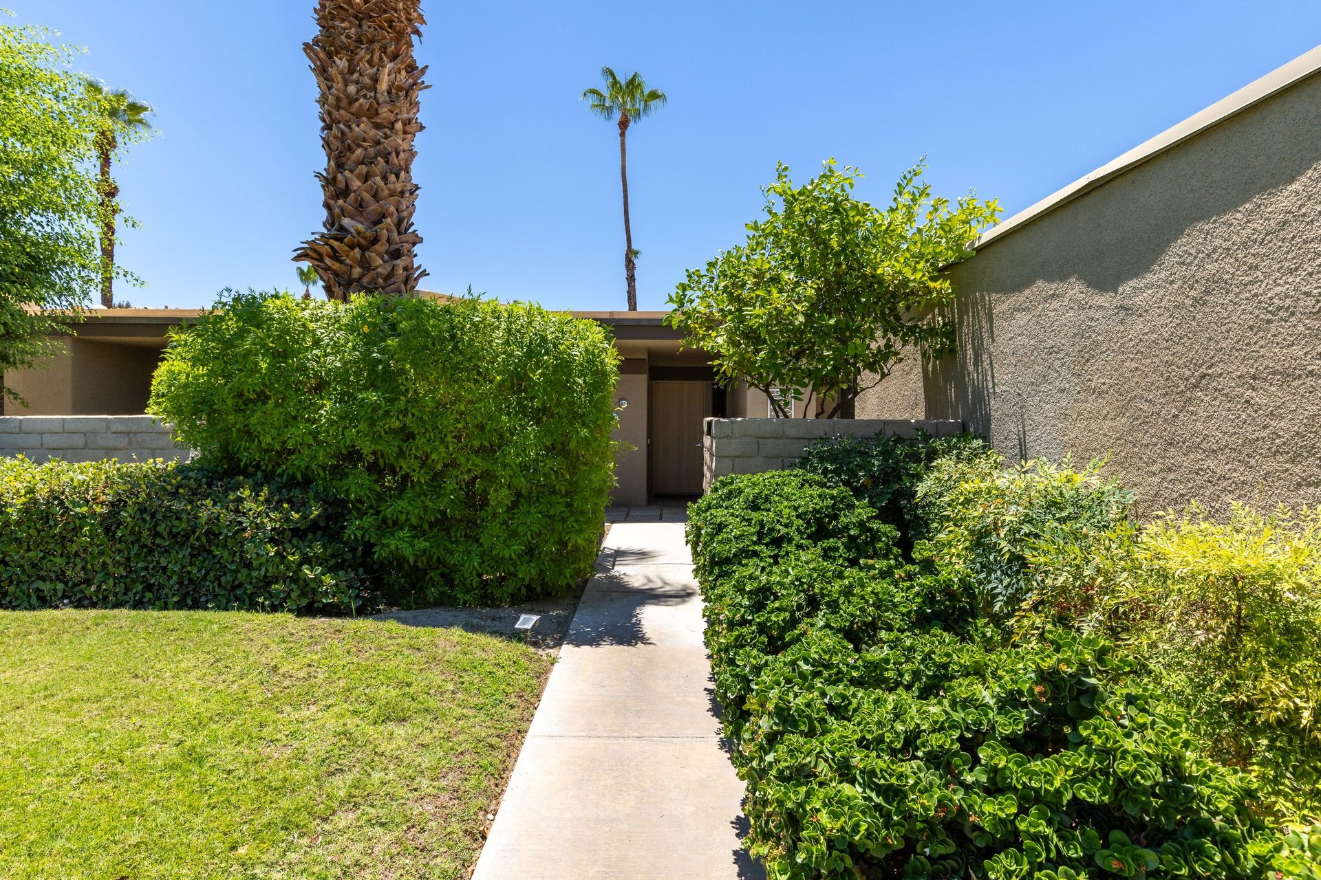 Walkway leading to the front door of the home.